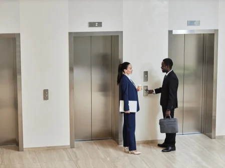 businesspeople-waiting-for-elevator-2023-11-28-05-04-13-utc